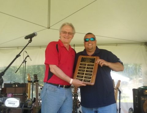 Ollie Tomasello of Plagido’s Winery accepts the Winery of the Year award from Dr. Gary Pavlis of Rutgers